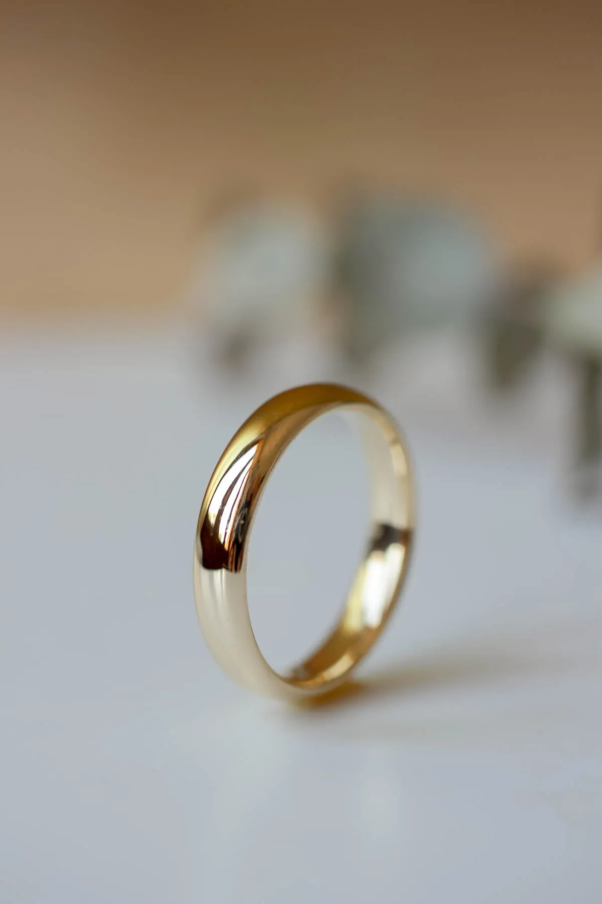 Wedding rings set for couples: classic band for him, branch band with diamonds for her